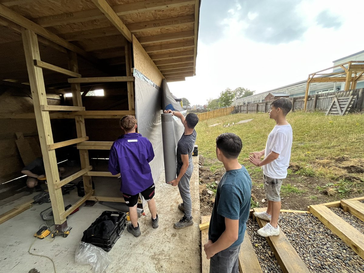 CATCHLeeds's tweet photo. Another weekend at @carr_manor with pupils and young volunteers to continue building a barn for goats 🐐🐐 joined by Andy from #EdenDevelopments. The rain didn’t stop us! This is a great opportunity for us to get out into the community whilst teaching young people skills. https://t.co/hVN5tPnB90