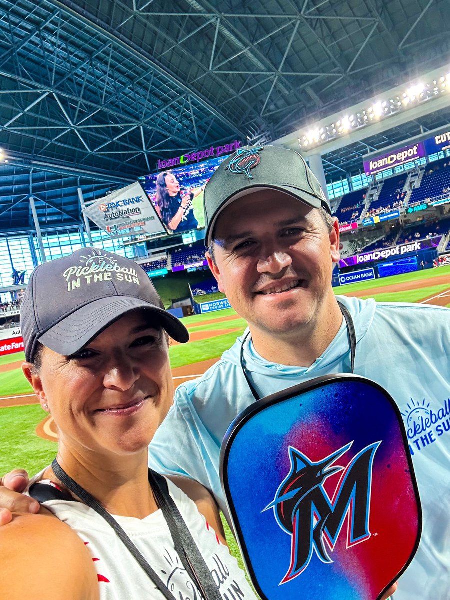 LauraGainor's tweet photo. Another Pickleball Day promotion knocked out of the park with some @pickleballinSun! The @Marlins hosted @PPAtour &amp; @lacocinapb pros on a pickleball court outside, vendor experiences, @AnnaLeighWaters throwing the first pitch &amp; custom Marlins paddles. #pickleball #makeitmiami https://t.co/z0hrDL8Fha