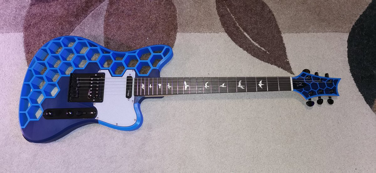 danny6869's tweet photo. Finished up my version of a 3d printed #prusacaster guitar.  Modded to take a humbucker and a Strat style single coil.

It plays, and sounds great.  I highly recommend this project.

You can find my remix here: https://t.co/Y7kMkMafms https://t.co/lFyVphSkEd