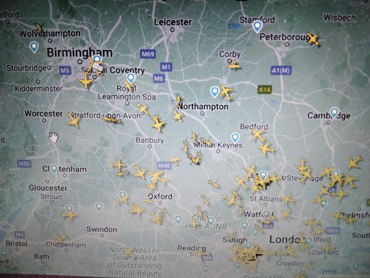 Anyone know why there's loads of helicopters flying between Birmingham and London in both directions? 🚁 they seem to be hanging around the Milton Keynes area 🚁🤔 <a href="/flightradar24/">Flightradar24</a>