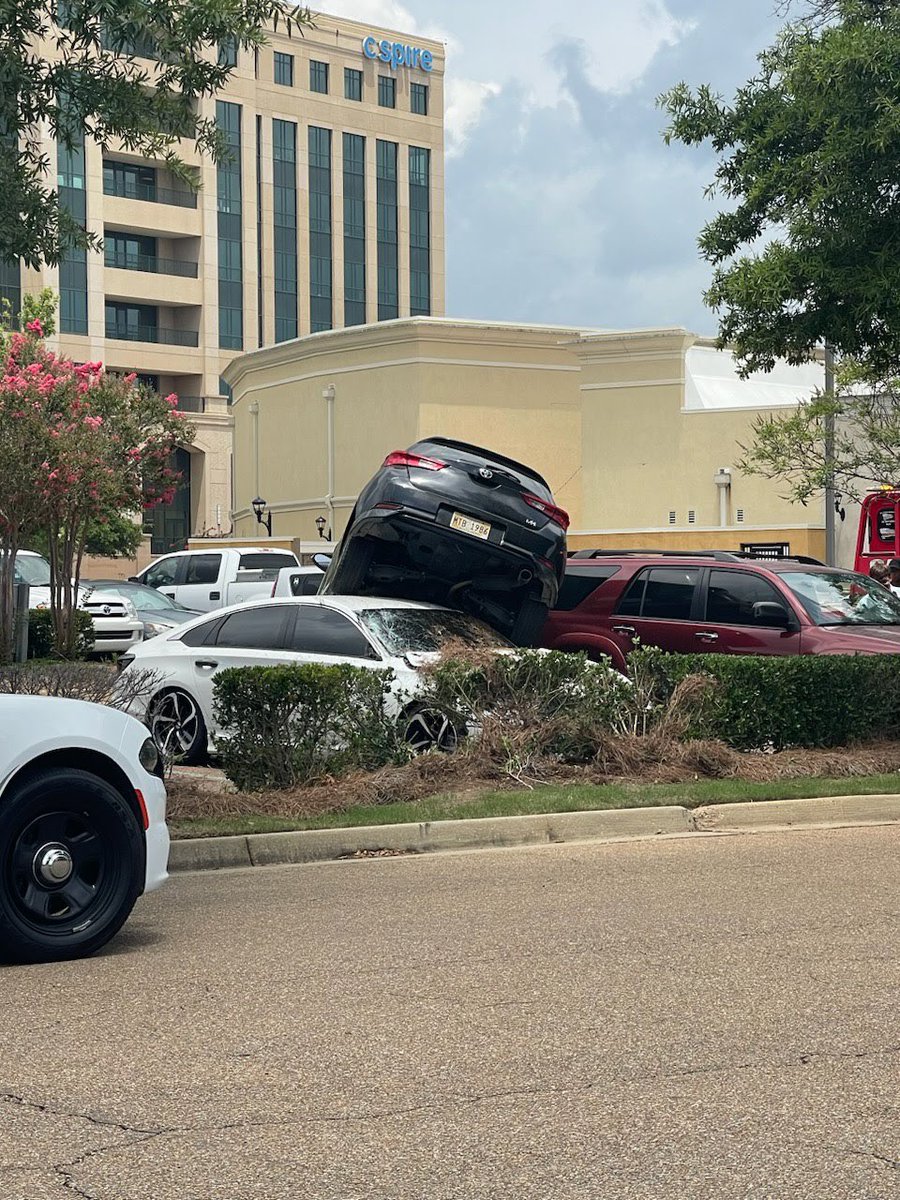 SaveJxn's tweet photo. How in the hell do you even do that in a parking lot? At Renaissance now. https://t.co/Mtlx66Po8B