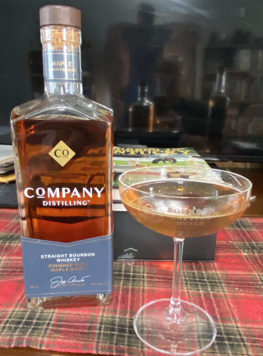 Chocolate Manhattan made with Company Distilling Bourbon and Chocolate Truffle liqueur with a Woodford Reserve bourbon marinated cherry. Yum!