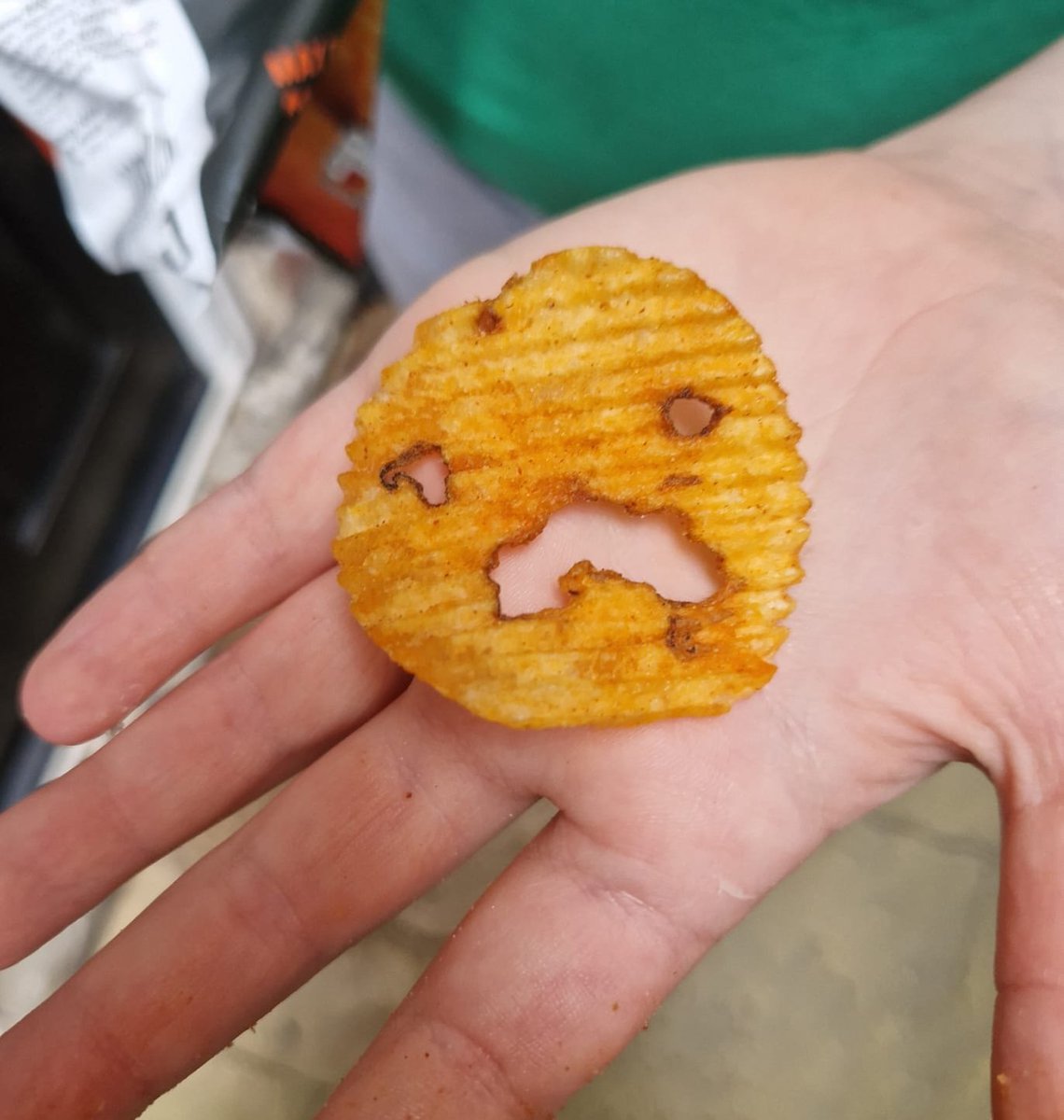 This poor crisp my son found in a pack of <a href="/walkers_crisps/">Walkers Crisps</a> looks truly terrified at its impending doom #CrispsThatLookLikeFaces