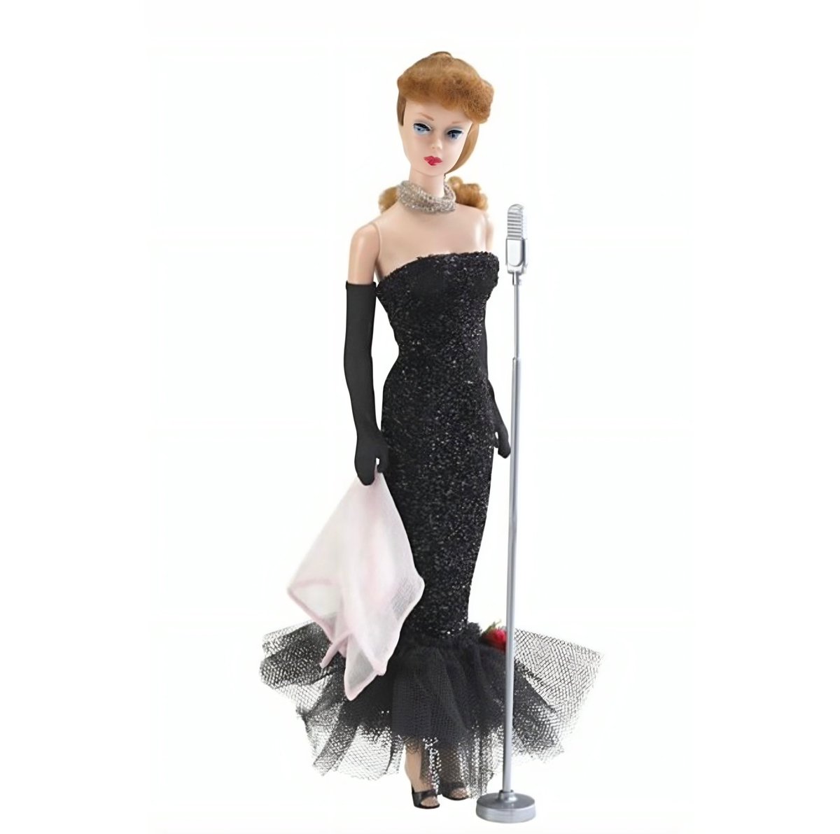 highendhomo's tweet photo. margot robbie referencing the ‘solo in the spotlight’ barbie from 1961 https://t.co/abJ8FSaWoA