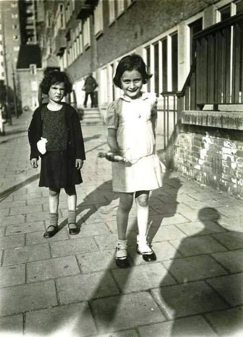 krassenstein's tweet photo. Below is a photograph of a Six-year-old Anne Frank holding a jump rope next to her friend, Sanne Ledermann, 

This photo was taken in 1935 on a sidewalk in Amsterdam.  This was a decade before she was killed by Nazis. Her friend Sanne was killed two years prior. 

Evil, hate and lies took this happy young girl away from us.   We must continue to fight against the demonization of people who are different from us.