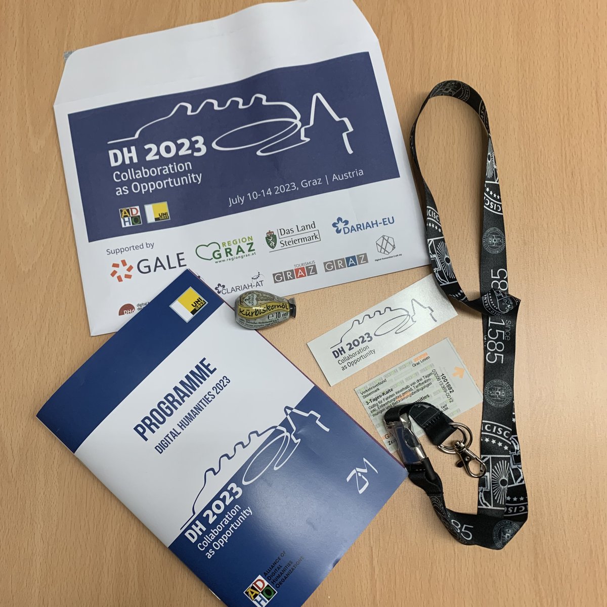 🎉 What to find in your check-in envelope: 
📚 Conference programme to guide you through the event 
🔖 Lanyard to display your badge
💫 Sticker featuring our conference logo
🎃 A "Kernöl-Drop" (pumpkinseed oil, Styria's regional speciality!)
🚋 Public transport ticket #DH2023