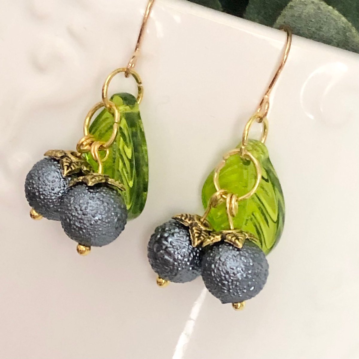 AlilynnD's tweet photo. Blueberry season is almost here! You need these earrings to get started! #etsy #etsyshop #foreveryseasonshop #fruitearrings #earrings #handmade #artisan https://t.co/GQp9ACtVl7 https://t.co/b16GvOe9z7