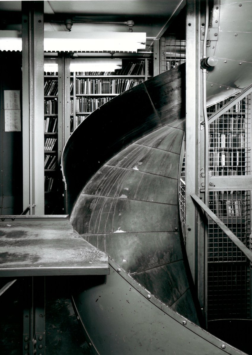 britishlibrary's tweet photo. Oh books, wonderful books, marvellous books, glorious books! 😍

We've always loved a good #shelfie – like these ones from our former home on Great Russell Street in 1986 (also who else would love a slide down the book chute?)

#WeAre50 https://t.co/g6EK2q0rQg
