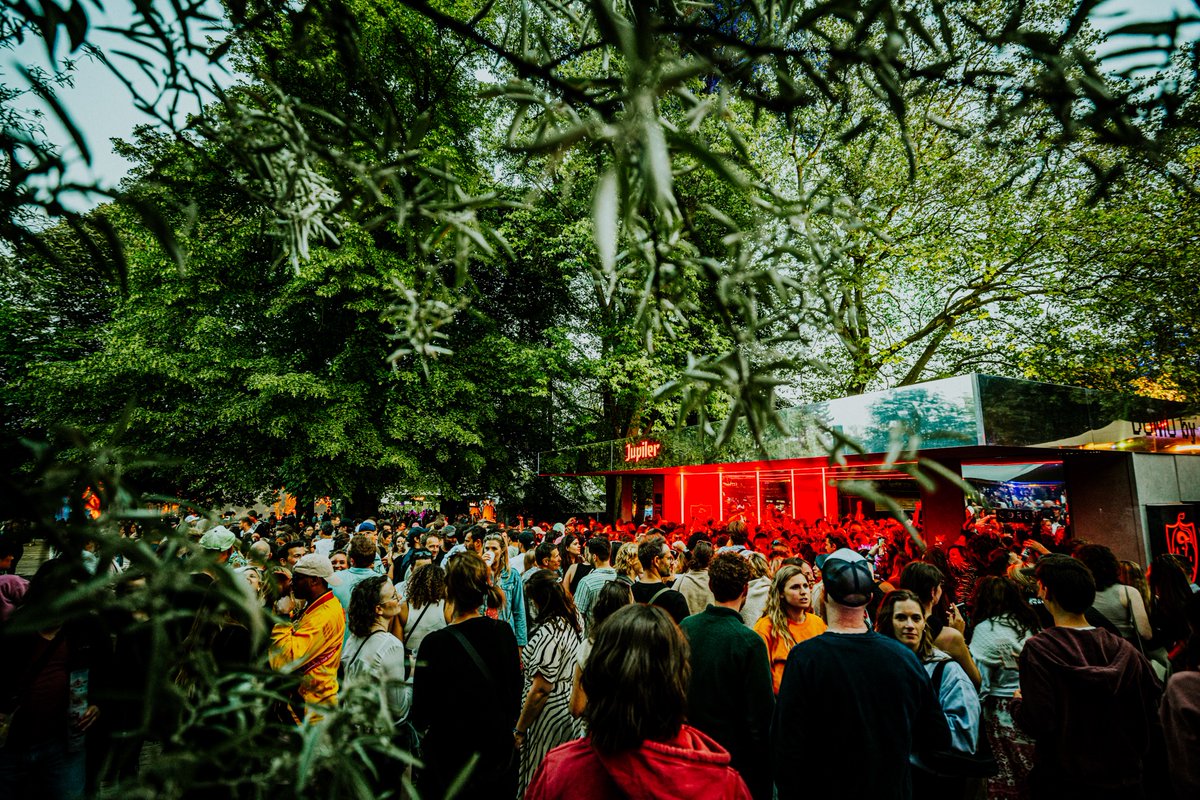 People dancing and creating deep connections while celebrating at the intimate Domo stage.