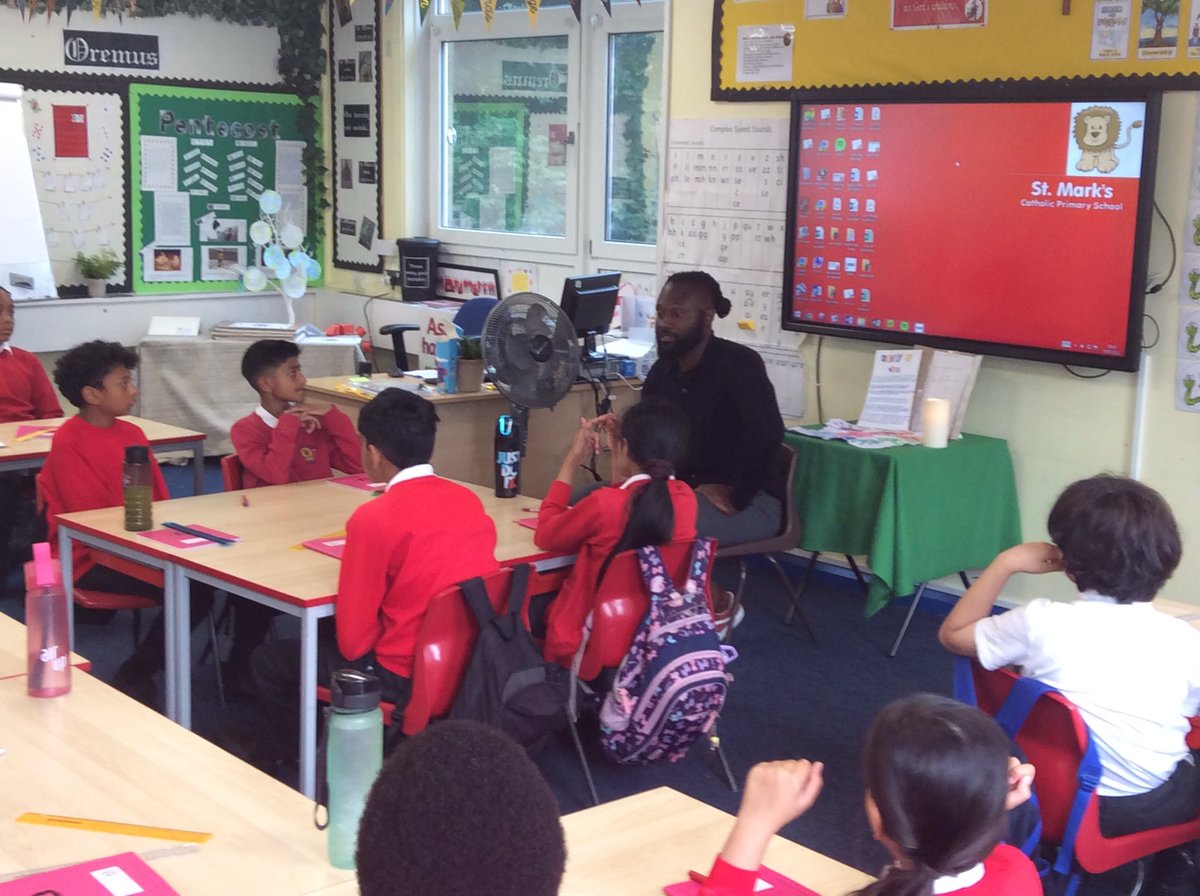 StMarksRC's tweet image. To kick-start our vocations week, KS2 are spending the morning speaking with Mr Reid. Mr Reid represented Jamaica 🇯🇲 and Great Britain 🇬🇧 as an athlete. He told us all about his vocation,the importance of having a positive mindset and how his faith has guided him. 🙏🏾#CatholicLife