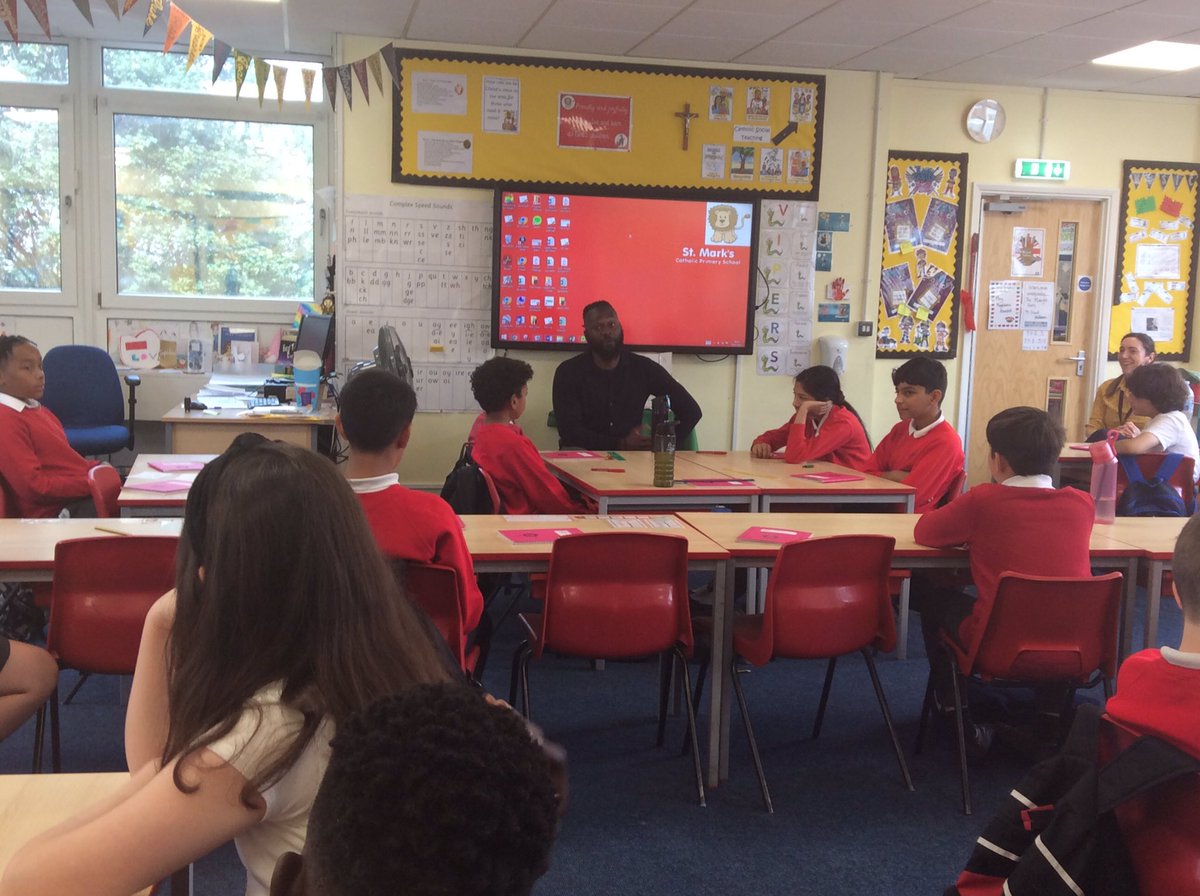 StMarksRC's tweet image. To kick-start our vocations week, KS2 are spending the morning speaking with Mr Reid. Mr Reid represented Jamaica 🇯🇲 and Great Britain 🇬🇧 as an athlete. He told us all about his vocation,the importance of having a positive mindset and how his faith has guided him. 🙏🏾#CatholicLife
