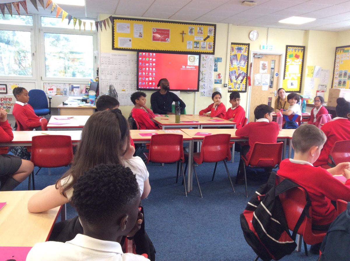 StMarksRC's tweet image. To kick-start our vocations week, KS2 are spending the morning speaking with Mr Reid. Mr Reid represented Jamaica 🇯🇲 and Great Britain 🇬🇧 as an athlete. He told us all about his vocation,the importance of having a positive mindset and how his faith has guided him. 🙏🏾#CatholicLife
