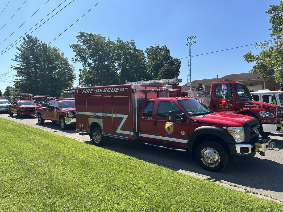 egdesantis's tweet photo. First responder vehicles from all over the Tri-State are parked at Tell City High School as people gather to pay respects to Sgt. Heather Glenn @14News https://t.co/KOy04SS9k4