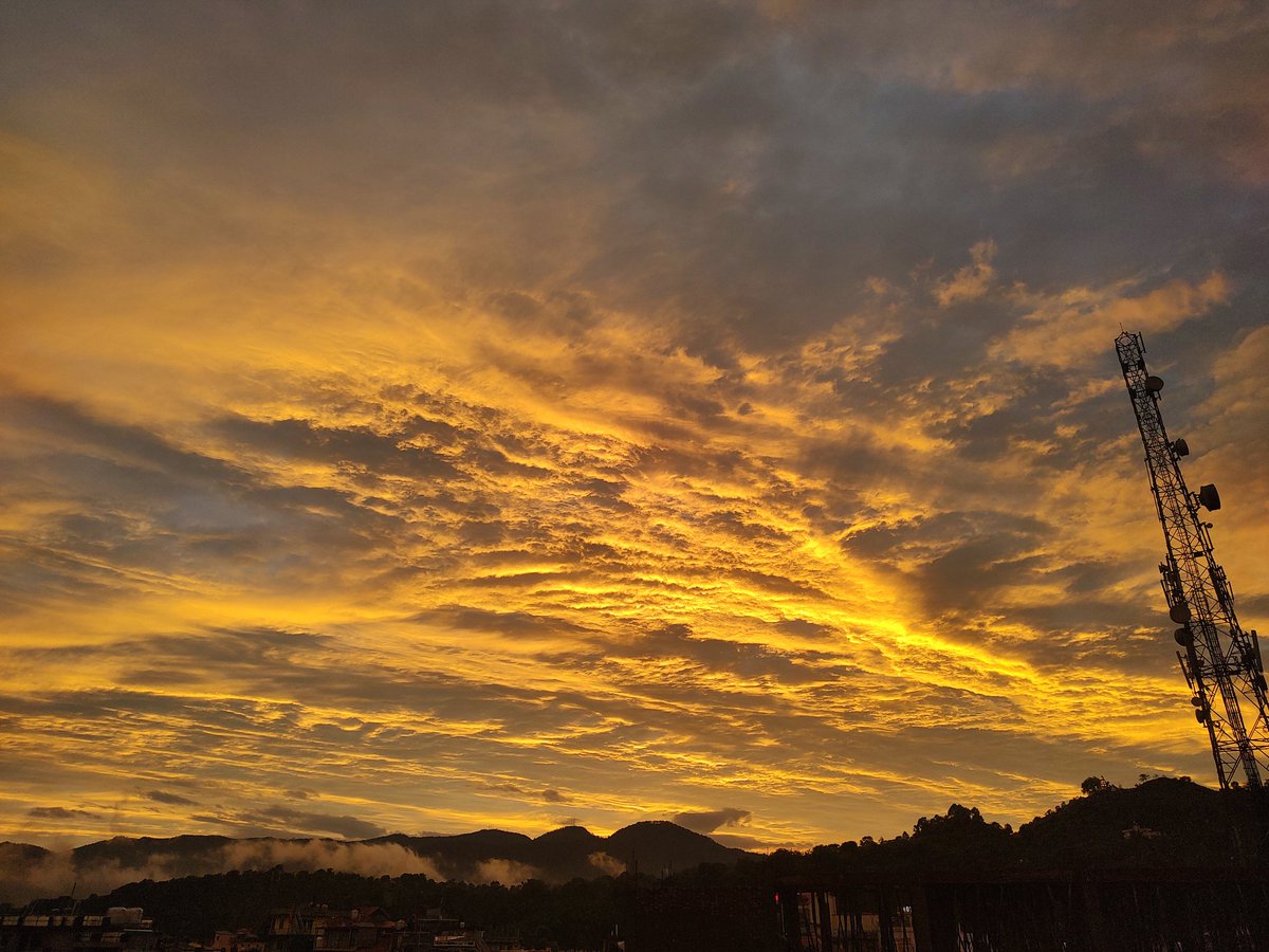 VermaAnaita's tweet photo. #HimachalPradesh 
Finally rain stops and orange hue covers the sky.
I hope this is the end to catastrophic damage . https://t.co/azT5tueCqG