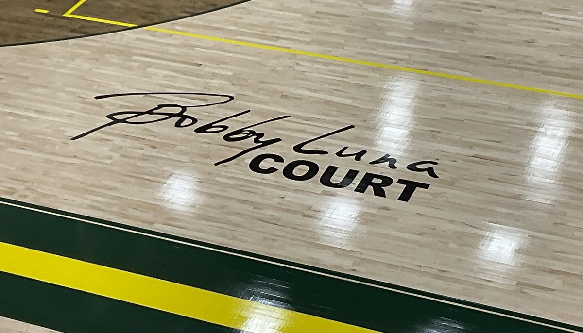 Not only a new design but announcing the naming of our gym floor after <a href="/luna_bobby/">Coach Luna</a>! Well deserved recognition for a teacher, coach, and man that is a true reflection of #GWP and #EarnstheG in everything he does. <a href="/GHSGreenWave/">Gallatin Green Wave Athletics</a> <a href="/WAVEbasketball/">GHS Basketball</a>