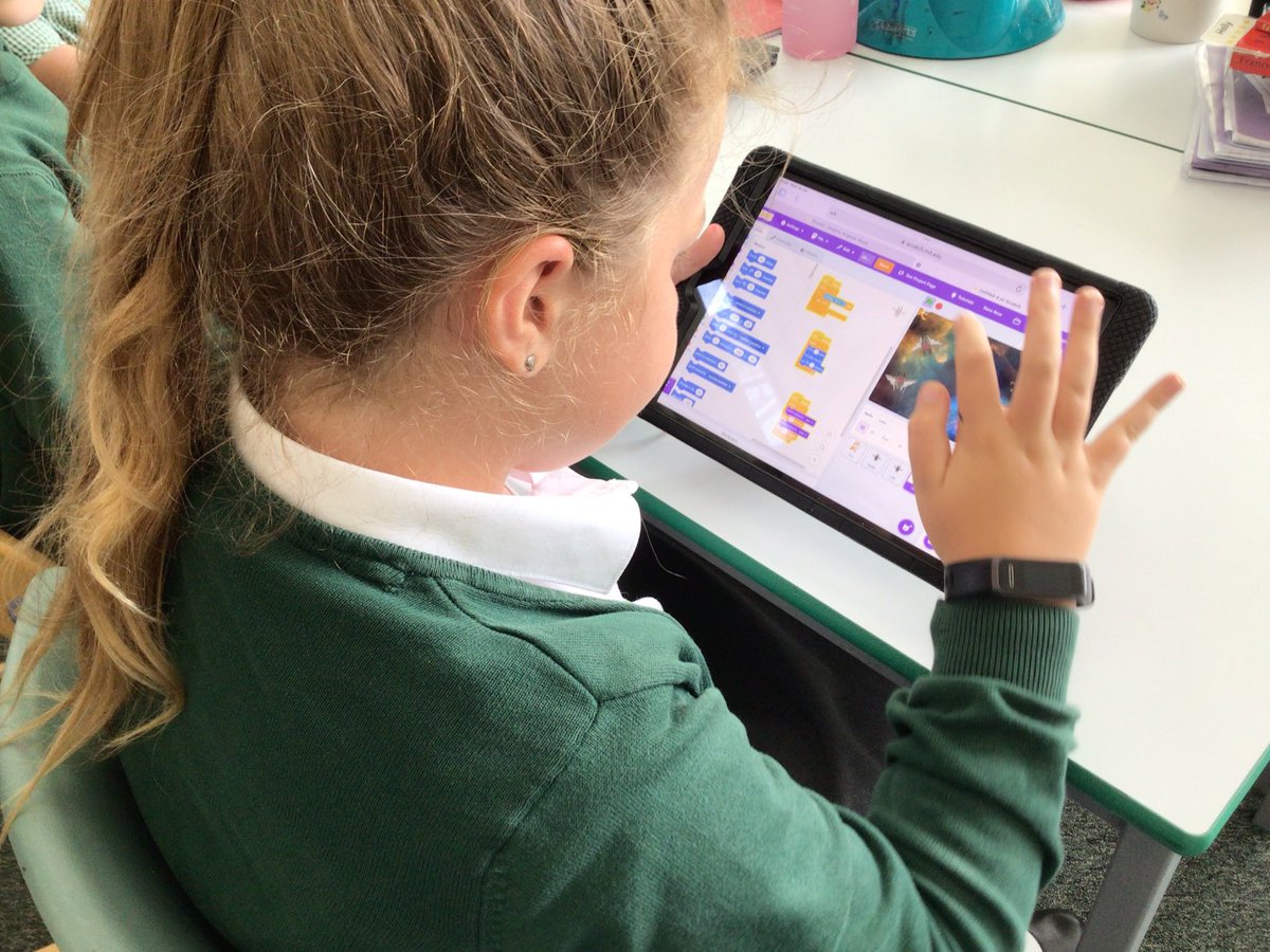 OJS_Year4's tweet photo. Year 4 working hard to create games with Mr Woods our visiting computing expert#repetitioningames https://t.co/w9s8aidCZV