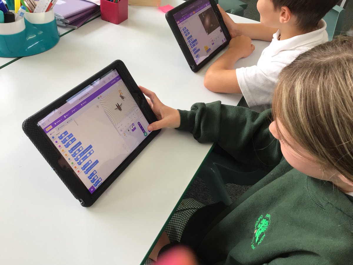 OJS_Year4's tweet photo. Year 4 working hard to create games with Mr Woods our visiting computing expert#repetitioningames https://t.co/w9s8aidCZV