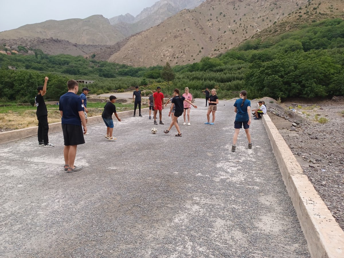 🌄BGS #WorldChallenge Morocco - The acclimatisation walk at High Pass didn't phase our pupils - they still had plenty of energy left to play football with some of the local young people. The team are heading out to Toubkal base camp today. 🚶‍♂️🚶‍♀️

 #BuryGrammarSchool #BGSY9 #BGSY10