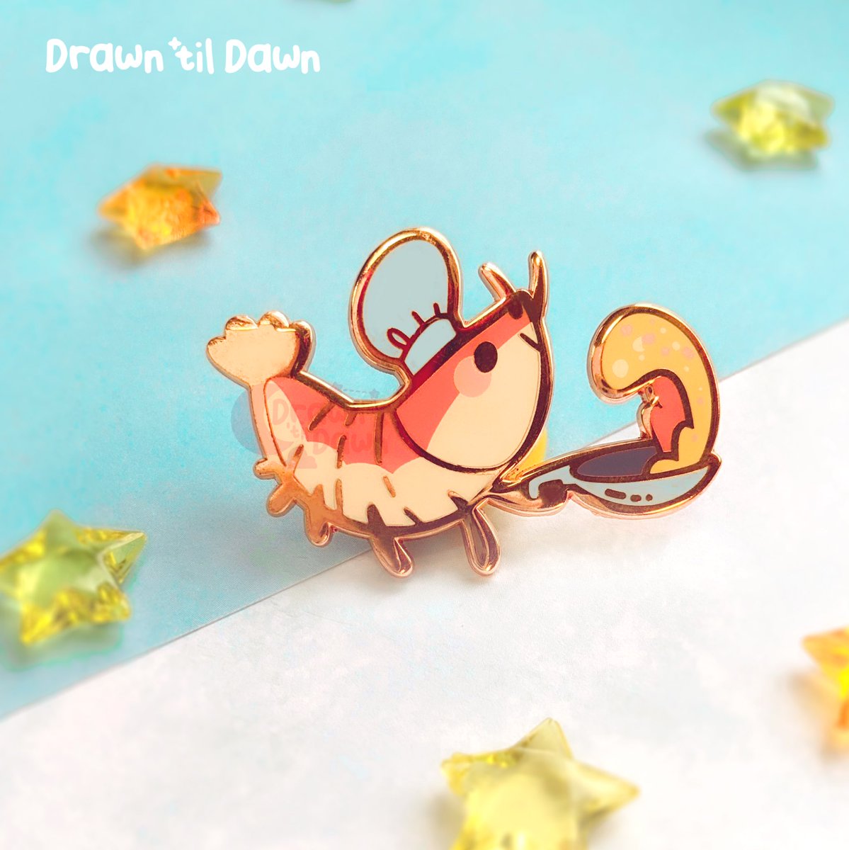 DrawnTilDawn's tweet photo. Shrimp enamel pins are finally here!

I’m still prepping them so I’m aiming to have a small update before I leave for DC, but these will definitely be available at Otakon 💜 https://t.co/8nX7tO7pDQ