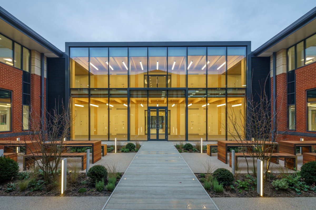 <a href="/GframeStructure/">G-frame Structures Ltd</a> designed, supplied + installed CLT + Glulam for this workspace extension which was key to overcoming access issues via an old weight restricted railway bridge. 2 wings of the existing 38,000 sq ft office building are connected create a welcoming ‘heart space.’