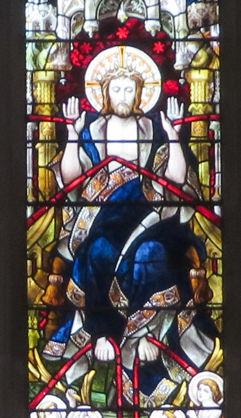 Lots of focus on Christ's blood in this image from the east window of Fitzalan Chapel, Arundel Castle, England -- I don't have details on the window, but surely late 19th, early 20th c. Photo Feb. 2022.