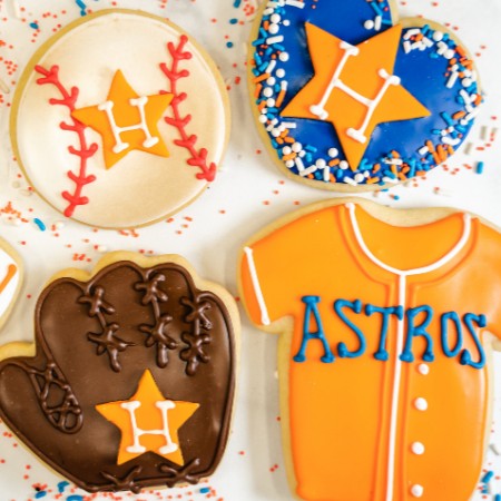 Go 'Stros! 💙 🧡 Baseball season is in full swing. ⚾ Show your pride for Houston's team with some Hand-Decorated cookies from Dessert Gallery. Order online to enjoy with the next game!