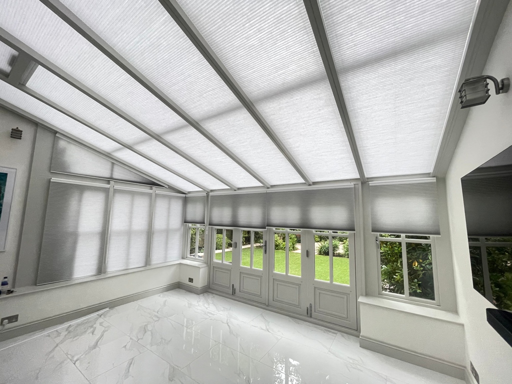 CBlindsLtd's tweet photo. This #summer enjoy the comfort of your shaded conservatory with our help. Our #bespokeblinds are able to fit into all types of complex shapes that can be found in a #conservatory , achieving the most #precise fit, while the #motorised blinds retract away gracefully. https://t.co/Nw0YyJDnZD