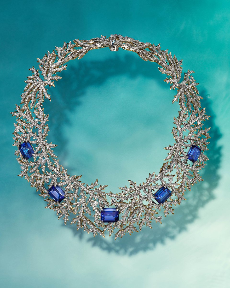 Tiffany artisans re-envision coral's forms and exuberant hues in a breathtaking necklace featuring emerald-cut tanzanites of over 62 total carats and round brilliant diamonds of over 42 total carats. Discover more: bit.ly/3NIZGDS #TiffanyHighJewelry #TiffanyBlueBook