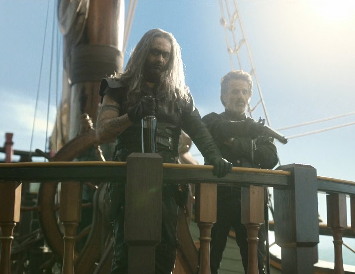 gothic dominatrix barbie &amp; 60s b-movie villain ken