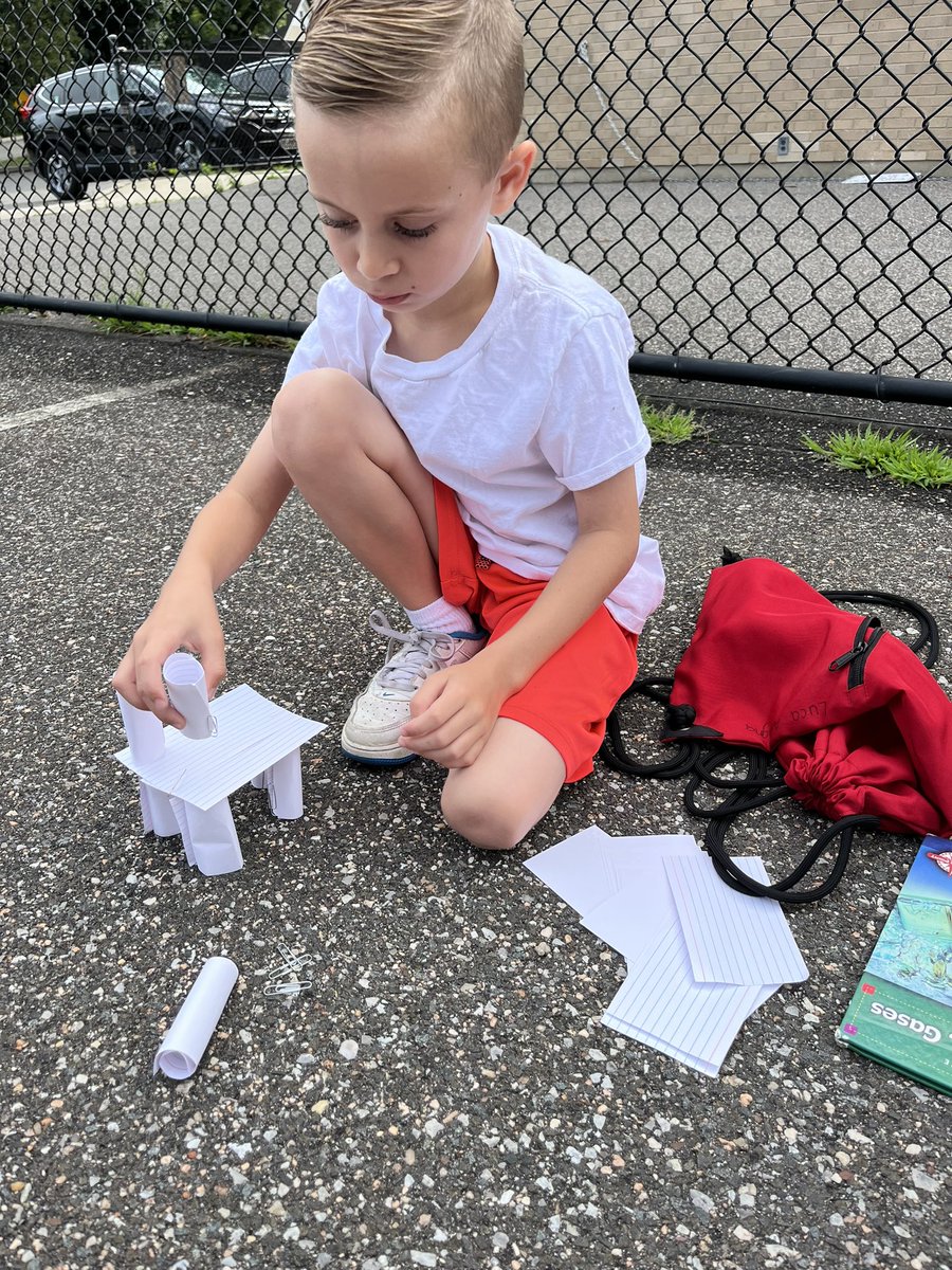 Building and testing index card structures for height and strength at North Shore Summer Experience.