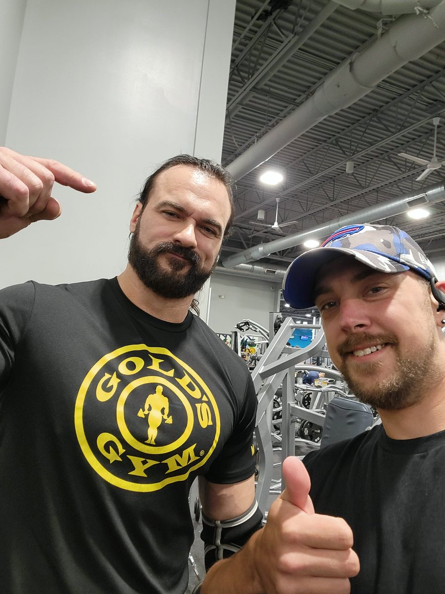 Fleshy26's tweet photo. Got to meet my sons and one of my own favorite WWE Superstars today at the gym! Drew McIntyre!!!! This guy is huge! Made me look so small lol. Can't wait to see him and the rest of the crew tonight on Monday Night Raw in Buffalo. So glad Drew's back #WWEBuffalo #WWERaw    #WWE https://t.co/EV1gUDoY9W