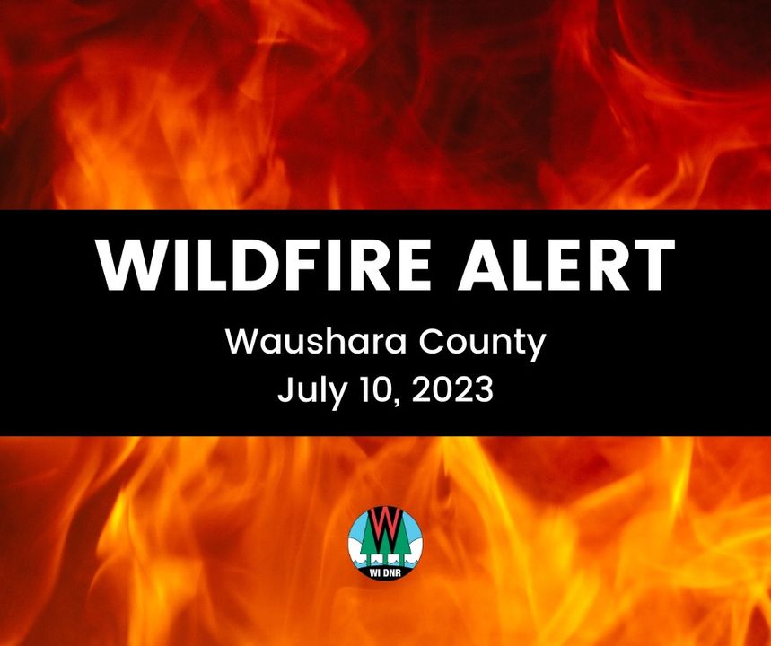 A graphic with flames in the background. Text overlaid says "wildfire alert- Waushara County - July 10, 2023"