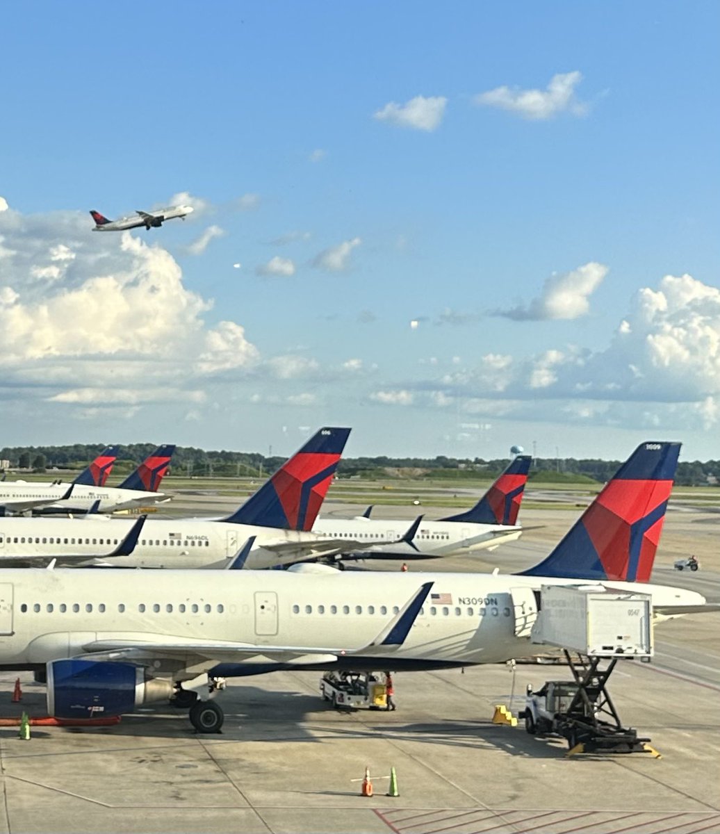 Atlanta airport- a lot of people want to complain, but I’ve been sitting here watching planes take off every 45 seconds! Dang!