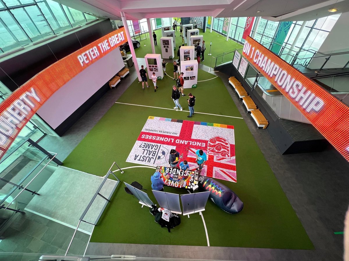 justaballgame's tweet photo. Hours before we fly to OZ for @FIFAWWC we will be back @FootballMuseum with our giant @england @Lionesses flag. Visit on Sat 15th, sign the flag and take home some JBG? freebies.
#Strongertogether #downunder
#flagtour #Wembley #Leigh #Brighton #London #MKDons #Manchester https://t.co/ECXLGUSlVT