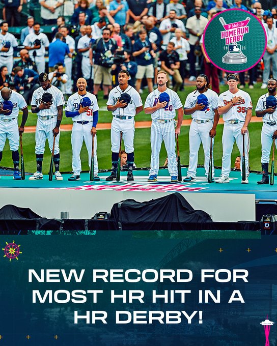 New record for most home runs in a Home Run Derby. Pictured: Adolis García, Luis Robert Jr., Mookie Betts, Julio Rodríguez, Pete Alonso, Vladimir Guerrero Jr., Adley Rutschman and Randy Arozarena with their hands over their hearts during the National Anthem at T-Mobile Park.