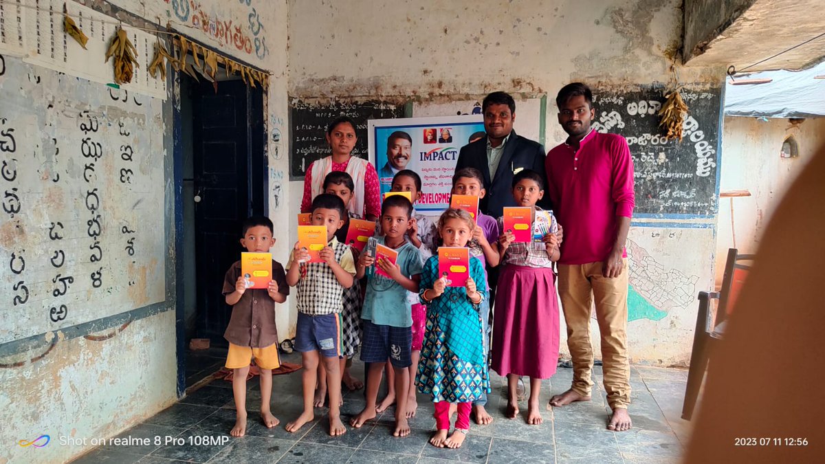 GP_Rajaram's tweet photo. Rajesham, a kind Impact Foundation volunteer, provided notebooks, pens and pencils to the students of Rajaram Primary School. https://t.co/x3AwxiNvF4
