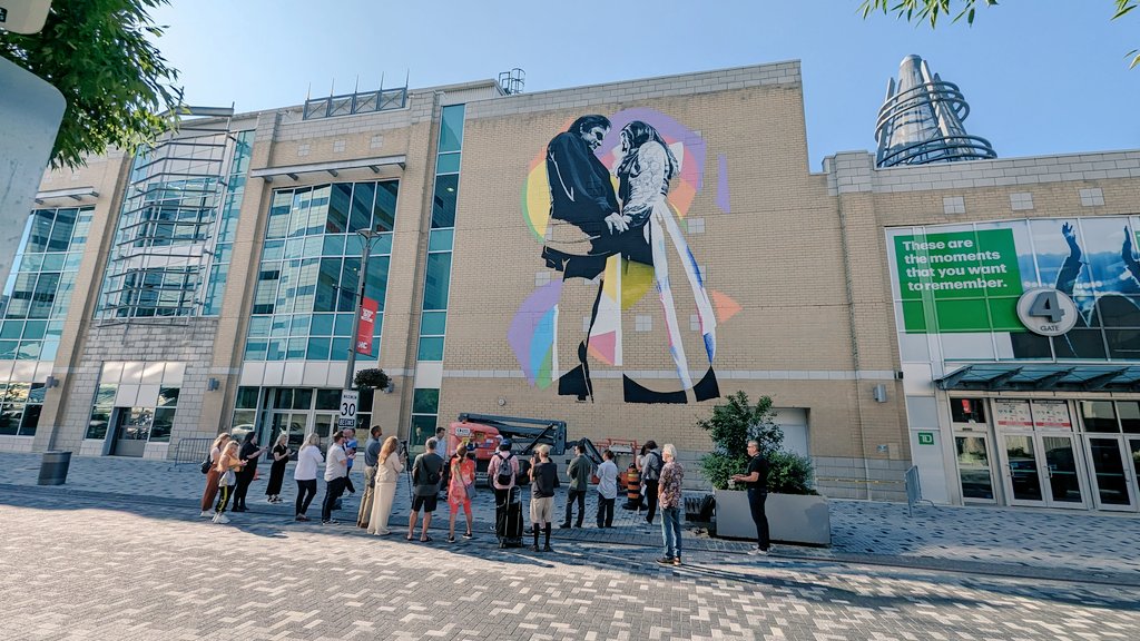 ScottatEmpyrean's tweet photo. Johnny and June unveil / going up outside gate four at  @BudGardens. Barring another rain delay we should be finished on Thursday.  Thank you to everyone involved.  #getDTL @Downtown_London https://t.co/C4ev5F6Crg
