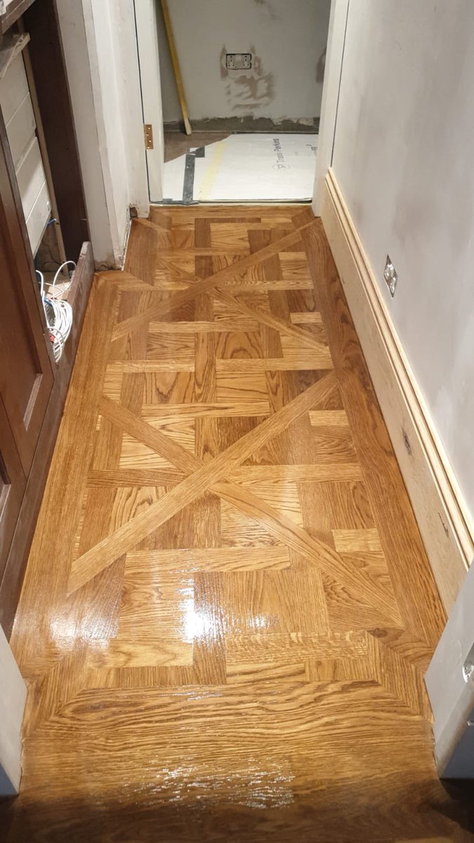 planet_flooring's tweet photo. Hand made #Versailles panels . These panels were hand cut in our workshop and fitted on-site, then sanded, stained and finished with #Osmo oil. Note the single frame that separates the components. Unusual but effective. https://t.co/JXihfOBb3P