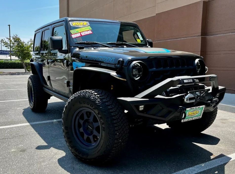 OwnACarCA's tweet photo. Our outstanding 2022 Jeep Wrangler 4xe Rubicon 4X4 takes a greener approach to trail-rated performance in black! This Four Wheel Drive SUV also rides with a Rock-Trac system and Dana axles so you can dominate where other SUVs fear to tread. Switch to gas-hybrid mode today! https://t.co/gyMAZKUVHQ