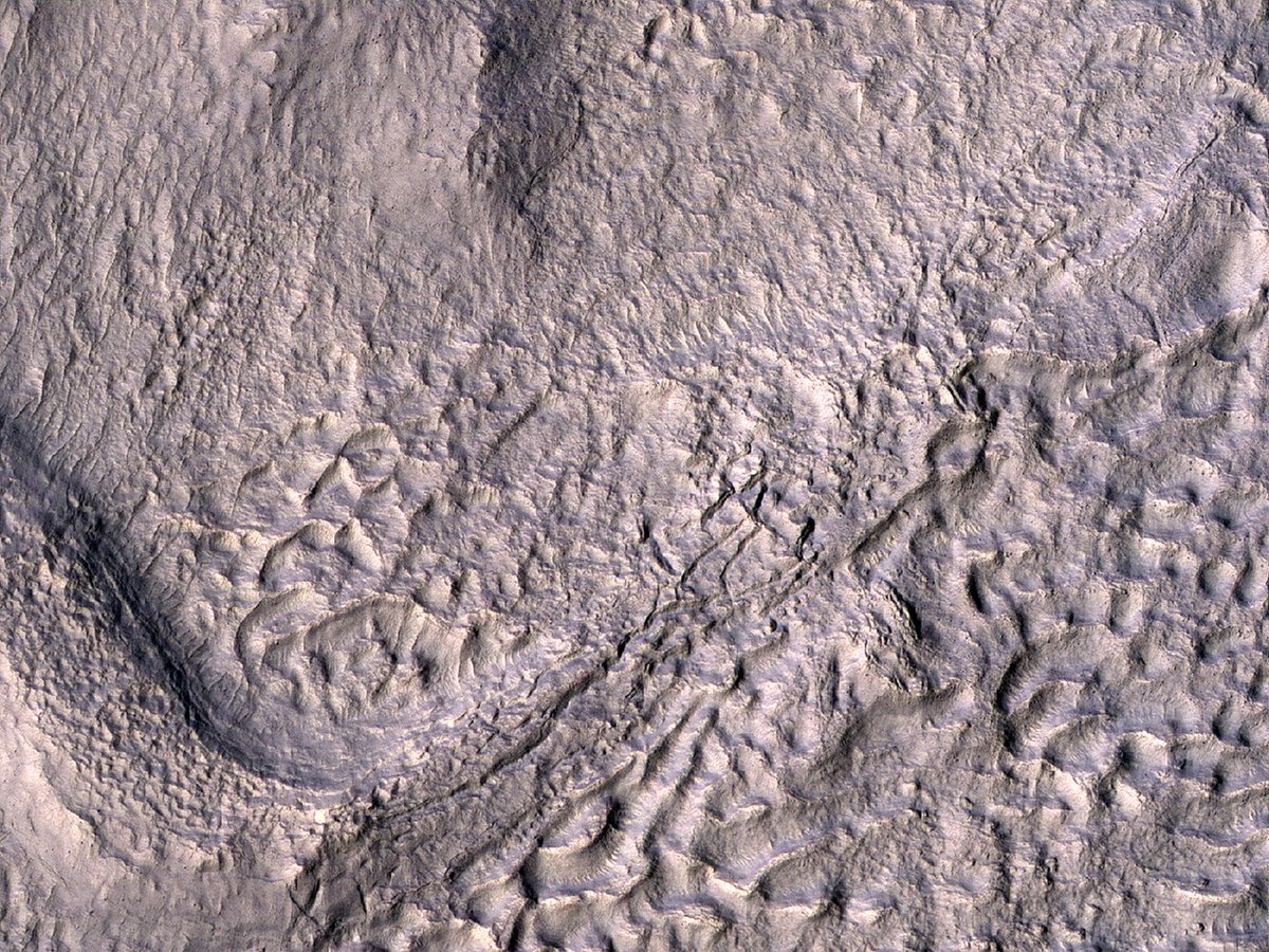 Sionus Ridge HiPOD: A Ridge and Channel through Ice Rich Terrain A sinuous ridge and ...