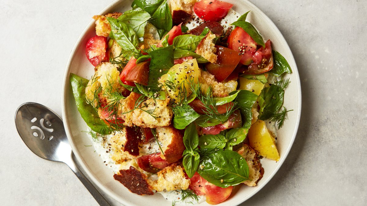 This riff on panzanella pulls inspiration from memories of standing barefoot in the garden picking cherry tomatoes off the vine and running inside to dip them into Hidden Valley Ranch. trib.al/Q4SPVLU