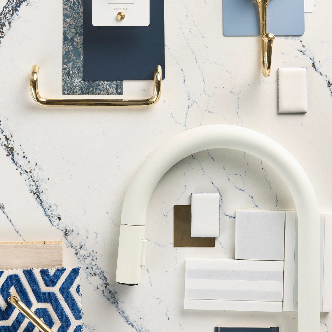 #MyCambria Portrush features an elegant creamy white base crisscrossed with bold navy, gray, and black veins accompanied by gleaming gold flakes. The perfect pop of color for any space: bit.ly/46xvS5H #WeAreCambria