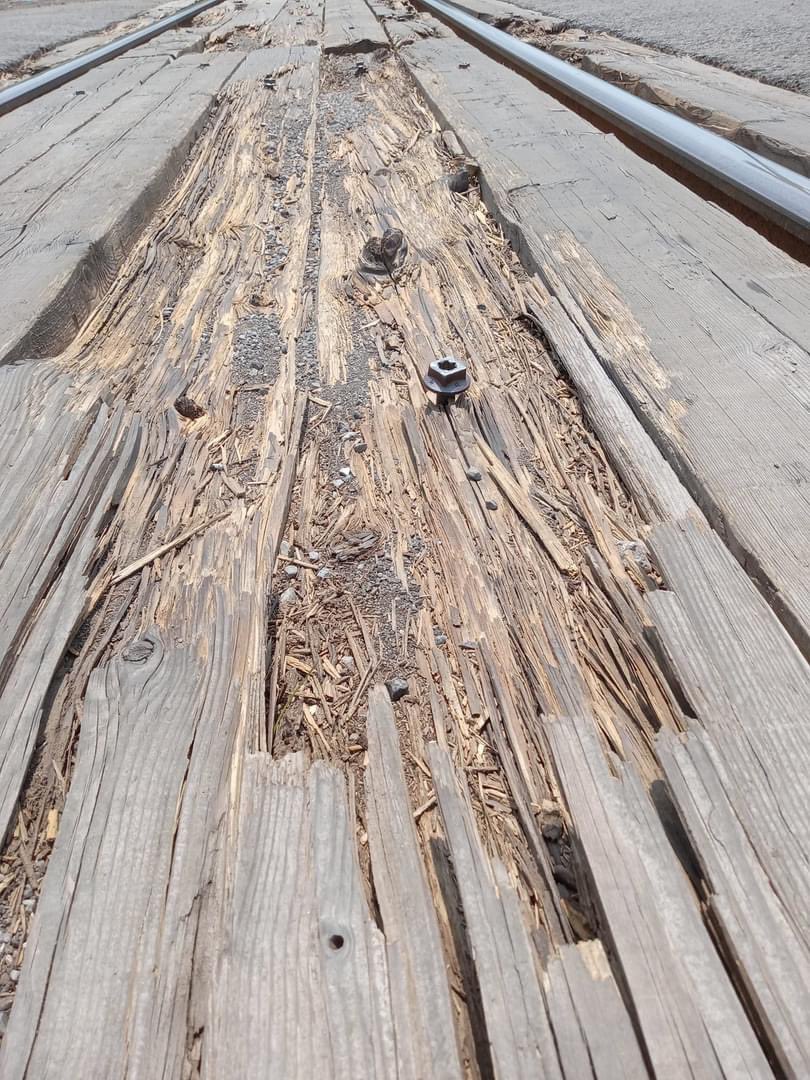 CooksMills's tweet photo. Hey @CAANiagara can we nominate Buchner Rd in @Welland for worst road? Disrepair courtesy of @CNRailway.  Reached out to contact@cn.ca over a month ago - still no response. A number of spikes up several inches and huge gaps along tracks.  Crossing is treacherous! #worstRoad https://t.co/ausugzVYRI