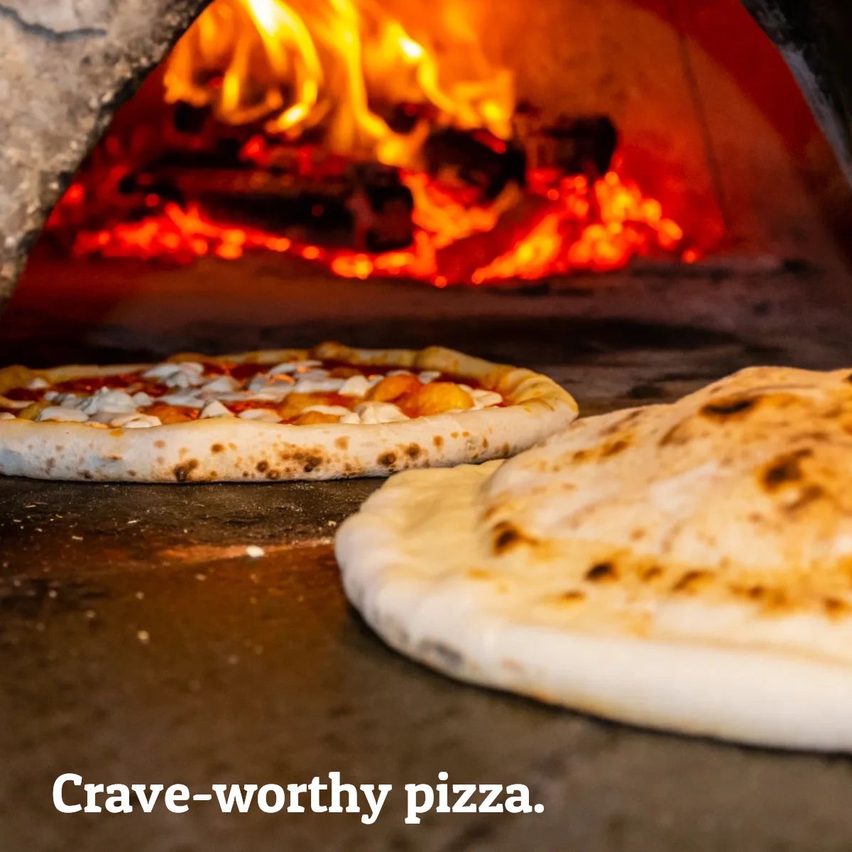 Craving a wood-fired pizza? Look no further! Our wood-fired ovens deliver that perfect crispy crust with a smoky flavor you will be thinking about long after the last bite. #WoodFiredPizza