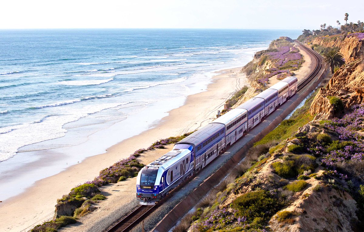 PacSurfliners's tweet photo. GREAT NEWS! 🎉 Tracks in #SanClemente will reopen starting Monday, July 17, and full train service is resuming to/from #SanDiego just in time for @Comic_Con and @DelMarRacing! Info: https://t.co/zFAIGbFNFA https://t.co/dNGuCX15bU