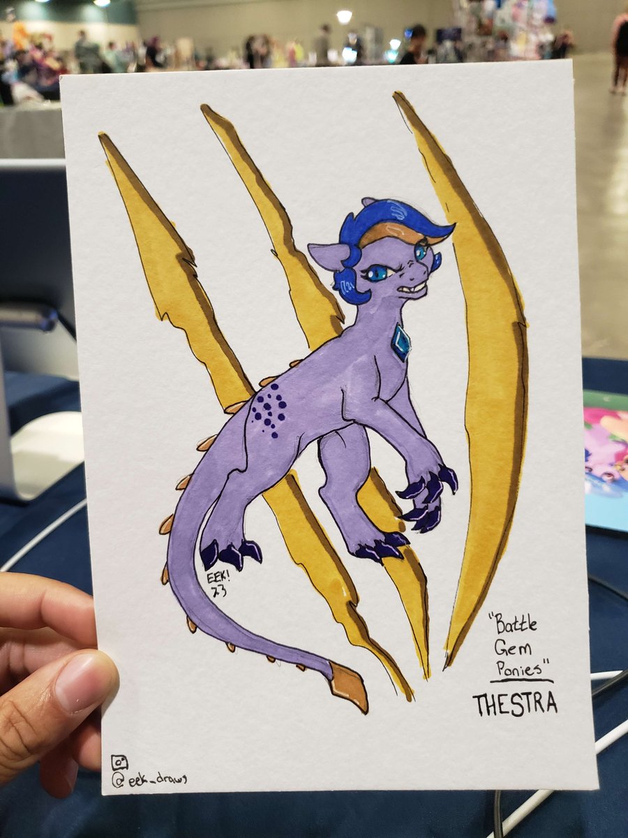 TonyYotes's tweet photo. Never received irl fan art before and it shakes me up the more I think about it... This is extremely special💜

Thanks for making my day @EEKdraws!  😁 
#TrotCon2023 #IndieGameDev #BattleGemPonies #Thestra #dragonoc https://t.co/svSJOxZuQo