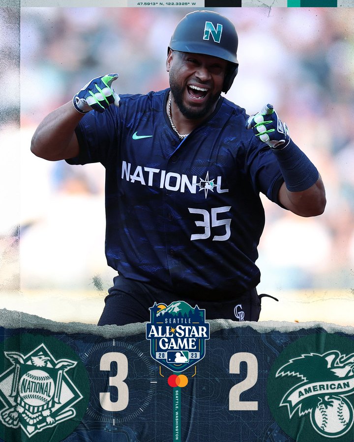 2023 MLB All-Star Game, Presented by Mastercard. Final: NL 3, AL 2 Pictured: Elias Díaz smiles and celebrates while rounding the bases after hitting a go-ahead home run during the 2023 All-Star Game. He is wearing a navy blue NL All-Star jersey and a navy blue batting helmet.
