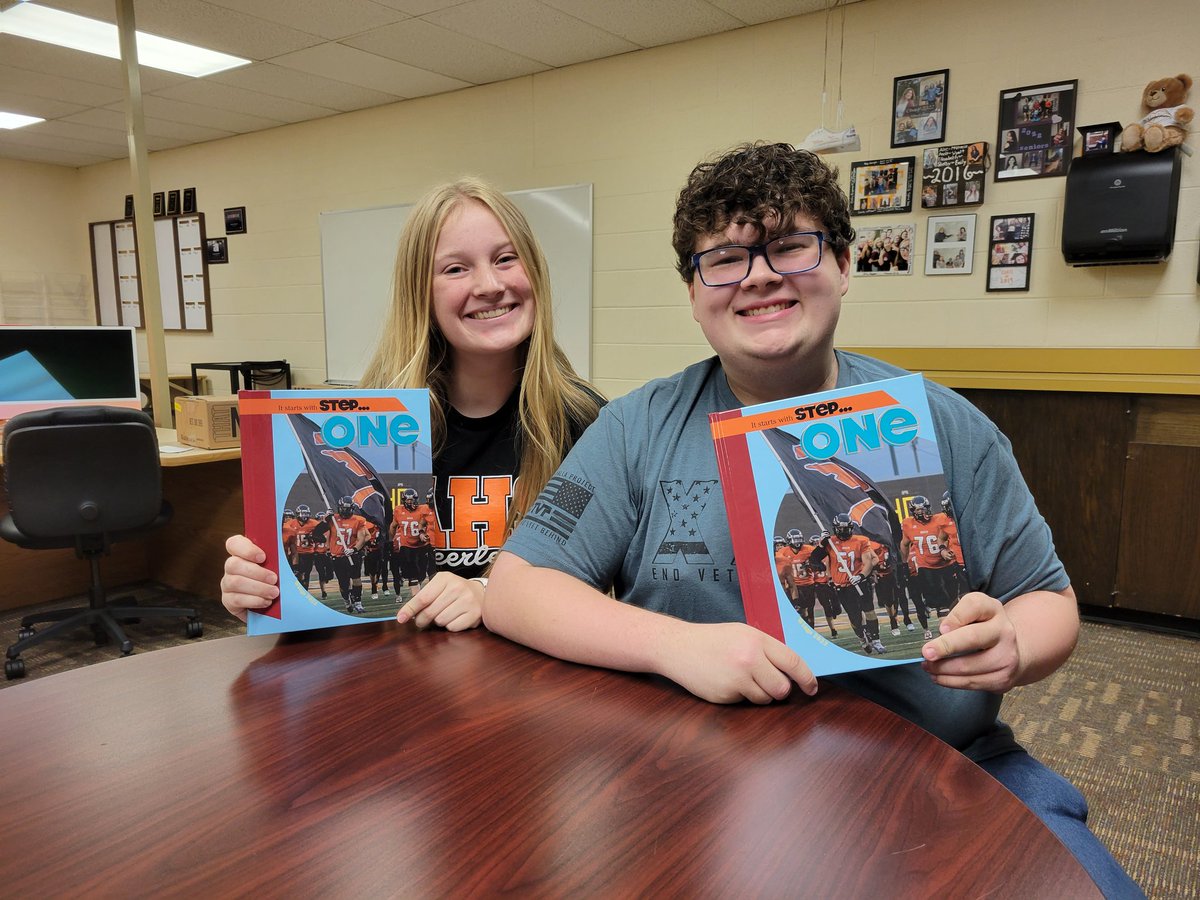 The 2023 yearbooks were delivered today. The editors  opened a box and were excited for the first look at the finished product.
