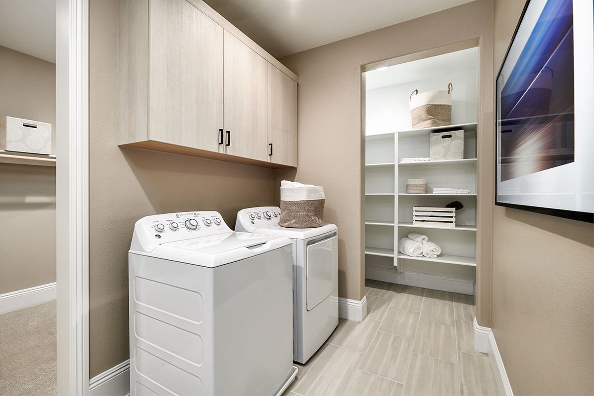 A5) Extra shelves in the laundry room allow it to pull double duty and act as an additional linen closet or a space to store spare sheets and towels. #KBtribechat