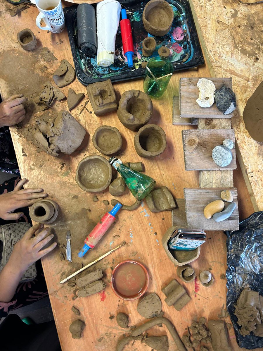 Oitijjo's tweet photo. #SummerofCreativity today with artist #uditdatta on clay. Tomorrow it is all about organic #Henna. The sessions are relaxing. Making new friends. Activities for children. Limited spaces. Tower Hamlet Residents. Book your space today: admin@oitijjo.org https://t.co/5lhwknJYde